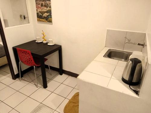 Kitchen, Circuit Suites near Malate Church