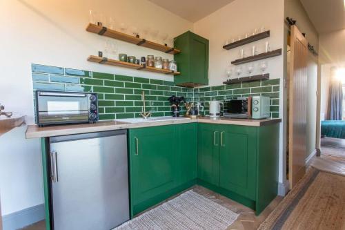 Contemporary Container with hot tub in Twerton