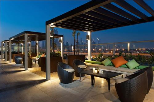 Vogue Downtown Stylish One Bedroom Apartment with Balcony and Unlimited Amenities Few Steps away from Burj Khalifa and Dubai Mall, Dubaj (zdjęcie 6)