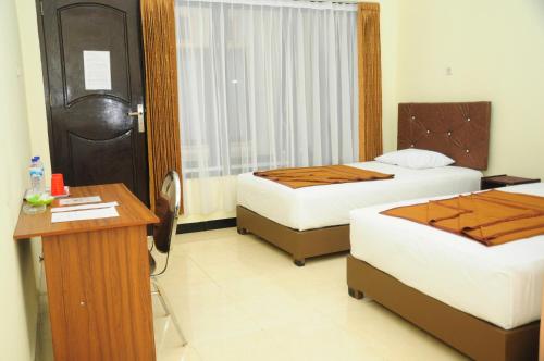 Dena Hotel in Taubneno