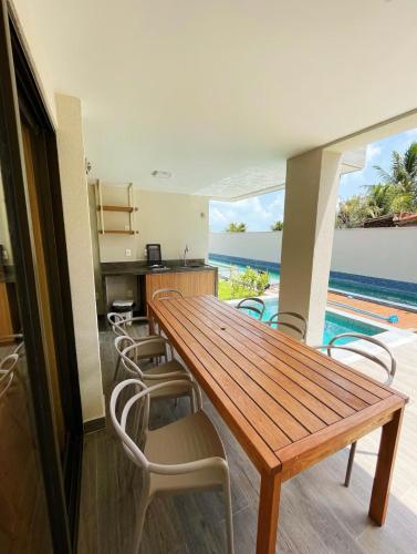 Térreo com 3 suítes beira-mar Térreo com 3 suítes beira-mar