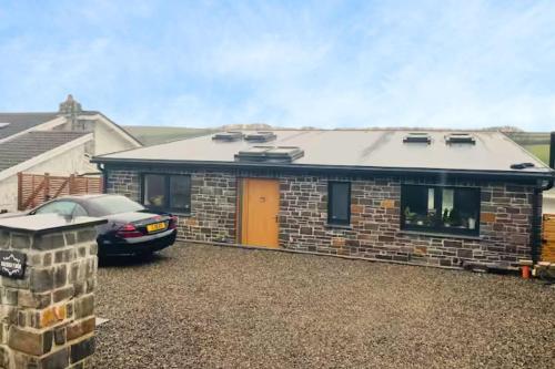 Exterior view, Otter's Pool Studio Apartment at Galwad Y Mor in Cardigan