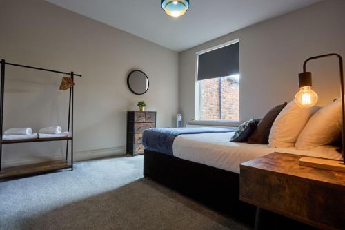 A selection of apartments in Golborne Business and Leisure WIFI Parking by Stone Pit Apartments A selection of apartments in Golborne Business and Leisure WIFI Parking by Stone Pit Apartments