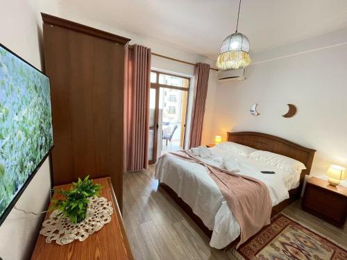 Studio Place Square 21, Tirana