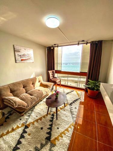 An apartment with ocean views & a garage