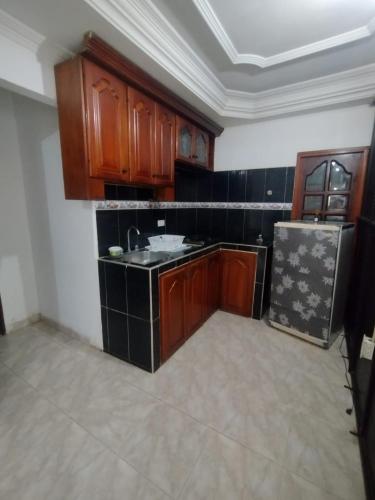 Kitchen, La fantastica Mi Hostal in Petares