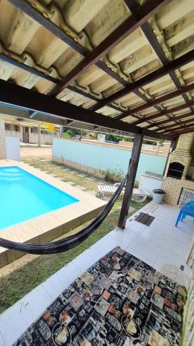 Meu Lugar de descanso à 250 metros da praia, piscina, churrasqueira