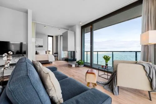 Heimathafen 1 Luxusferienwohnung in erster Reihe direkt am Strand mit Sauna und Kamin in Olpenitz, Deutschland