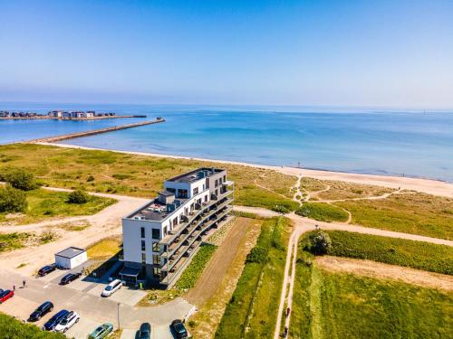 BeachTerraceThree- EG, barrierearm, Meerblick, Terrasse, Kamin, Sauna in אולפניטז