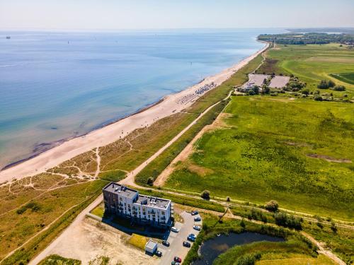 المنظر الخارجي, BeachViewTwo- 3OG, Meerblick, Balkon, Kamin, Sauna in Olpenitz