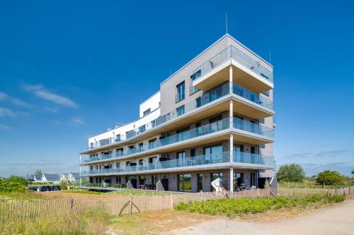 Eksterijer hotela, BeachViewFour- 3OG, Meerblick, Balkon, Kamin, Sauna in Olpenitz