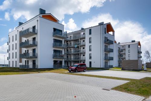 Exterior view, Ocean Lodge 2- 2 OG, Balkon, Ostseeblick, Kamin in Olpenitz