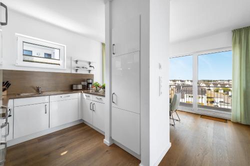 ห้องครัว, Ocean Sky- 3 OG, Maisonette, Balkon, Kamin in โอลเพนิทซ์