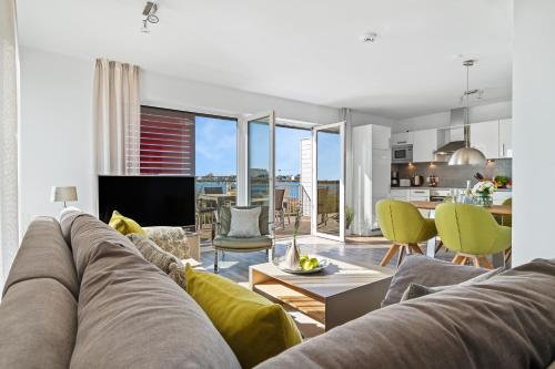 SeaLove 2- EG, barrierearm, Hafenblick, Terrasse, Hund, Infrarotsauna in Olpenitz