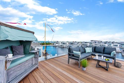 Balcony/terrace, 5 Beaufort - Wasserhaus, Meerblick, Sauna, Dachterrasse, Bootsanleger, Strandkorb in Olpenitz