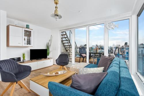 5 Beaufort - Wasserhaus, Meerblick, Sauna, Dachterrasse, Bootsanleger, Strandkorb in Olpenitz