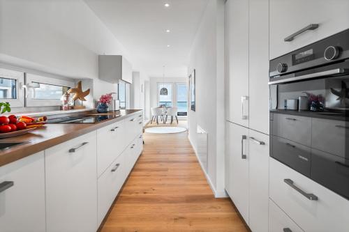 מטבח, Blue Sky - exklusives Penthouse mit freiem Blick auf die Ostsee in אולפניטז