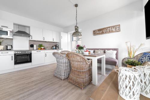 Konyha, Infinity Lounge – Ihre Ferienwohnung für den perfekten Ostseeurlaub (Infinity Lounge – Ihre Ferienwohnung fur den perfekten Ostseeurlaub) in Olpenitz