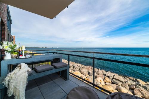 Erkély/terasz, Infinity Lounge – Ihre Ferienwohnung für den perfekten Ostseeurlaub (Infinity Lounge – Ihre Ferienwohnung fur den perfekten Ostseeurlaub) in Olpenitz