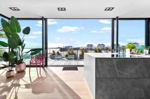 Konyha, Spimoev - Neues Designapartment mit Panoramablick auf Ostsee und Strand in Olpenitz