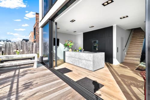 Erkély/terasz, Spimoev - Neues Designapartment mit Panoramablick auf Ostsee und Strand in Olpenitz