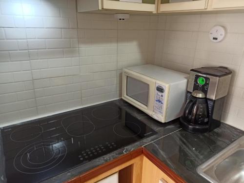 Kitchen, Exclusivo Aparto Suite California CC Lider near Climbing in Parque de Recreación Cuevas del Indio