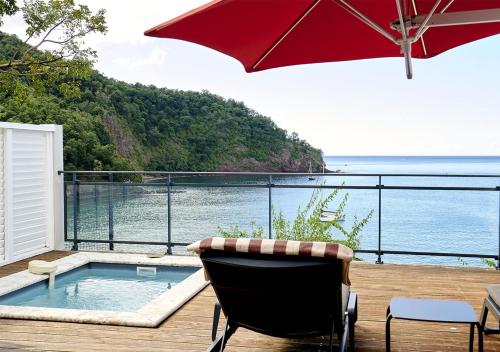 LES GALETS ROUGES LODGES & SPA in Bouillante