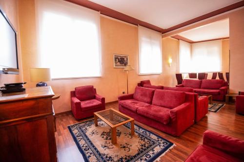 Közös társalgó / TV, Hotel Estense in Modena