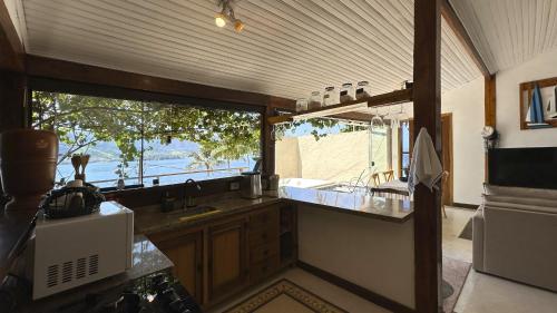 ห้องครัว, Refúgio na natureza com vista espetacular em Ilhabela (Refugio na natureza com vista espetacular em Ilhabela) in หาดปอร์ติงโย