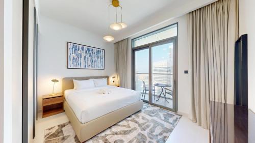 Vacationer Holiday Homes I Airy 1 Bedroom l Beach Access l Emaar Beachfront, Dubai (Foto 3)