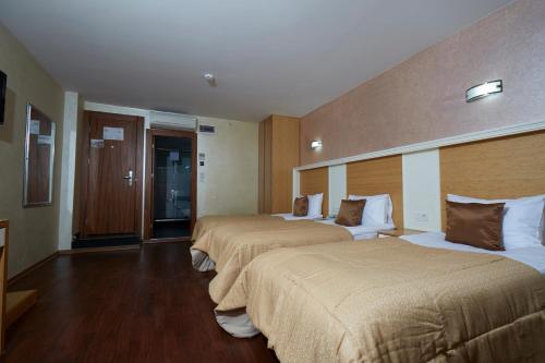Ilkbal Deluxe Hotel & Spa Room Type - Economy Triple Room (No View) Ilkbal Deluxe Hotel & Spa Room Type - Economy Triple Room (No View)