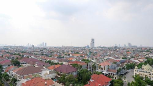 Extra Spacious and Homey 2BR at Kondominium Puncak Marina Apartment By Travelio, Sidoarjo