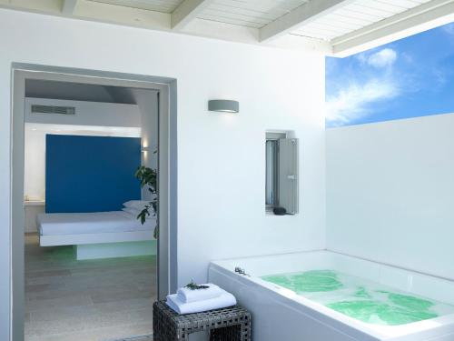 Aurora Luxury Suites - Tap to explore photos