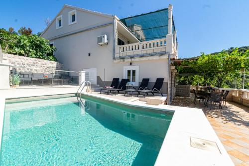 Seaside apartments with a swimming pool Tri Zala, Korcula - 558 - Location saisonnière - Korčula