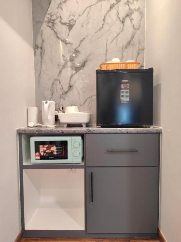 Near Airport K Avenue Homestay by MINO Suites