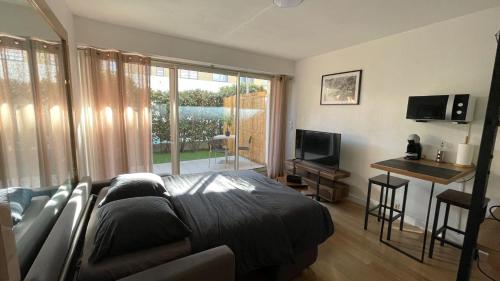 Studio proche plage avec jardinet et parking - Casa Garcia