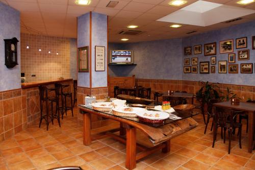 共用Lounge/電視區, Hostal La Granja in 皮內達德爾西古耶拉