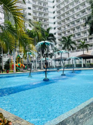 Aiza's Place in Shell Residences MOA