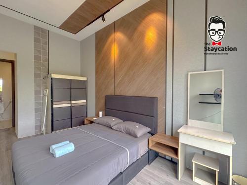 Staycation Homestay 65 Liberty Grove Near Airport near สนามบินนานาชาติกูชิง