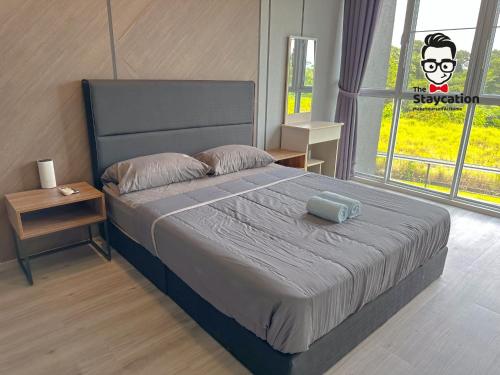 Staycation Homestay 65 Liberty Grove Near Airport near สนามบินนานาชาติกูชิง