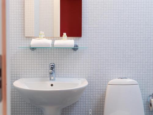 ห้องน้ำ, en gaffel kort pa Maritim in ซิมริสฮามน์