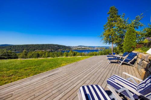 Villa in Kragerø with sea view, golf cart & RIB Villa in Kragerø with sea view, golf cart & RIB