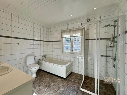 Villa in Kragerø with sea view, golf cart & RIB Villa in Kragerø with sea view, golf cart & RIB