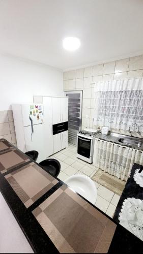 Sobrado em Condomínio Praia das Astúrias (Sobrado em Condominio Praia das Asturias) in 路易斯安東尼奧鎮