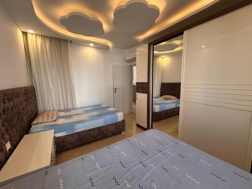 2-Bedroom Apartment on the Second Floor with a Balcony and amazing Pool View & Free Beach Access in Sharm Hills Resort