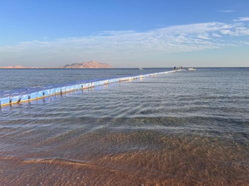 2-Bedroom Apartment on the Second Floor with a Balcony and amazing Pool View & Free Beach Access in Sharm Hills Resort