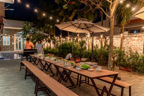 Wings House Homestay Hồ Tràm - 레스토랑