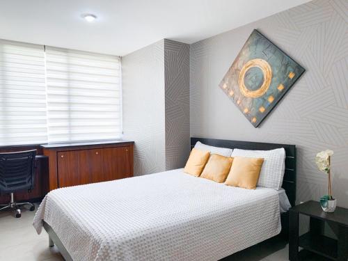 Depa en Bellini, frente al the point