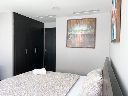 Depa en Bellini, frente al the point