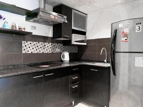 Depa en Bellini, frente al the point